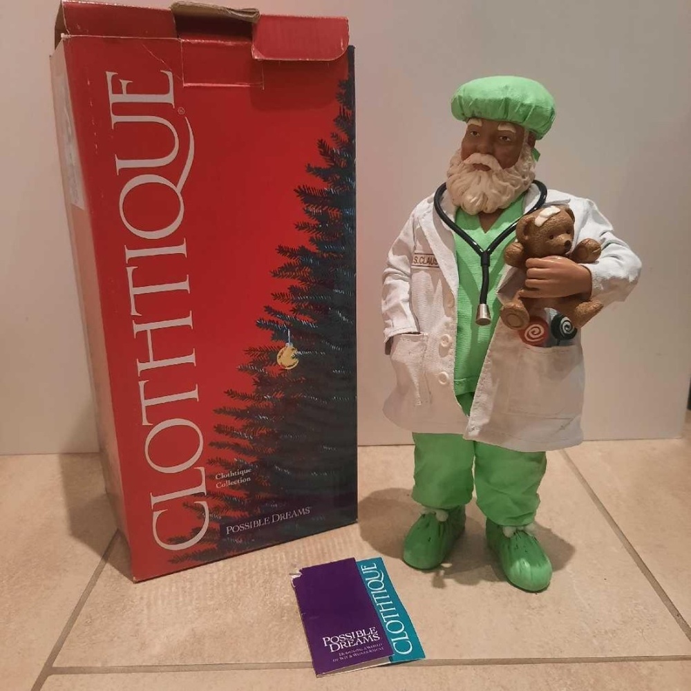 CLOTHTIQUE PAGING DR. CLAUS SANTA FIGURE